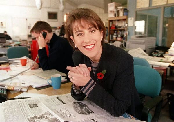 Kirsty Wark TV presenter at work November 1998 sitting at desk hands clasped