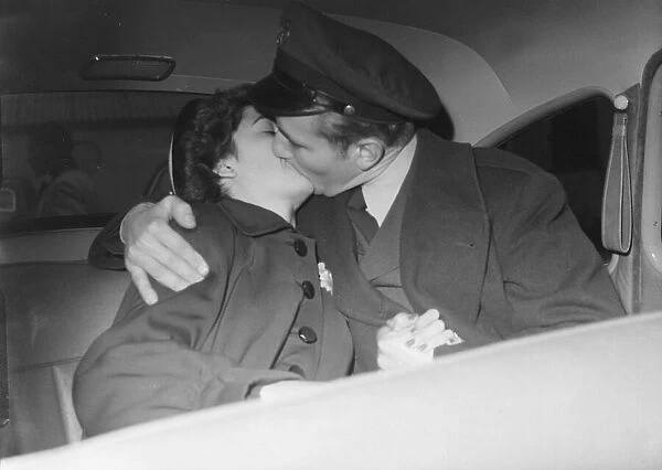 Kiss S. Sgt A Brander & wife 1952 C408  /  3