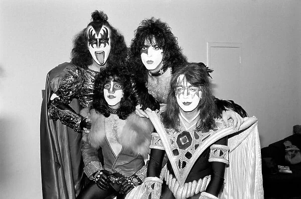 'Kiss', the spectacular and colourful American rock group pictured at heathrow