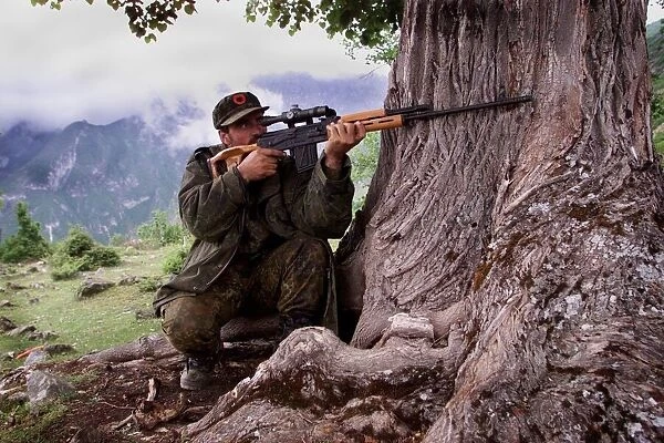 A KLA sniper in action in Kosovo May 1999