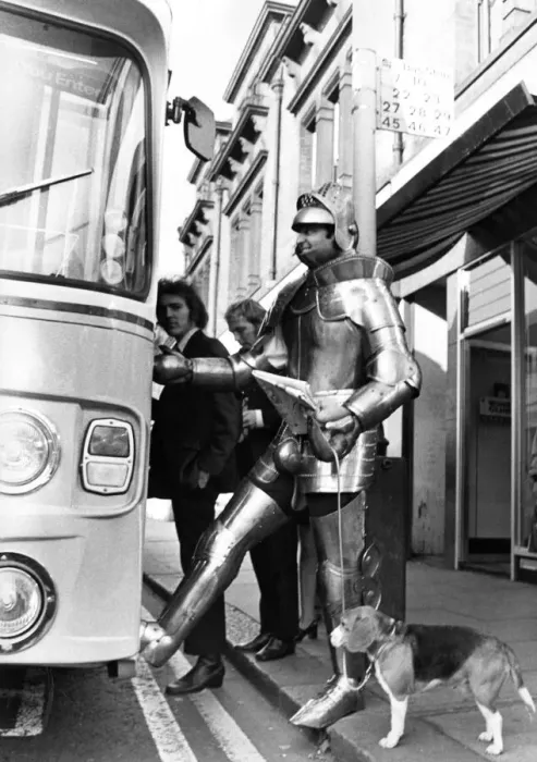 Framed Print : This knight causes a stir as he gets on a bus