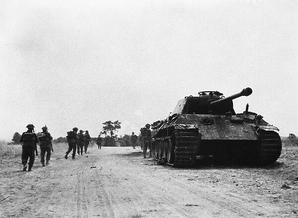 Knocked out German Mk. V Panther tank with 80mm gun near Bernieres-Bocage