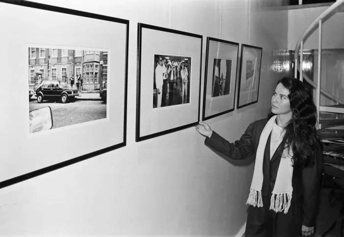 Framed Print : Koo Stark, Actress poses next to a print taken by herself Framed Print : Koo Stark, Actress poses next to a print taken by herself