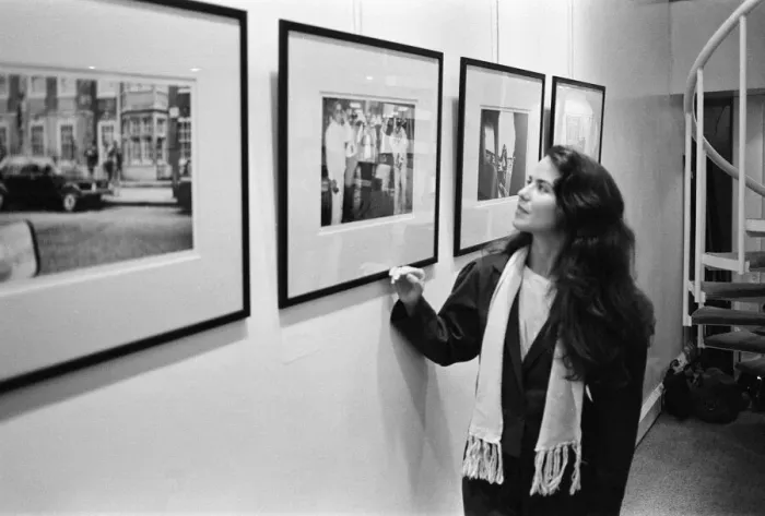 Framed Print : Koo Stark, Actress poses next to a print taken by herself Framed Print : Koo Stark, Actress poses next to a print taken by herself