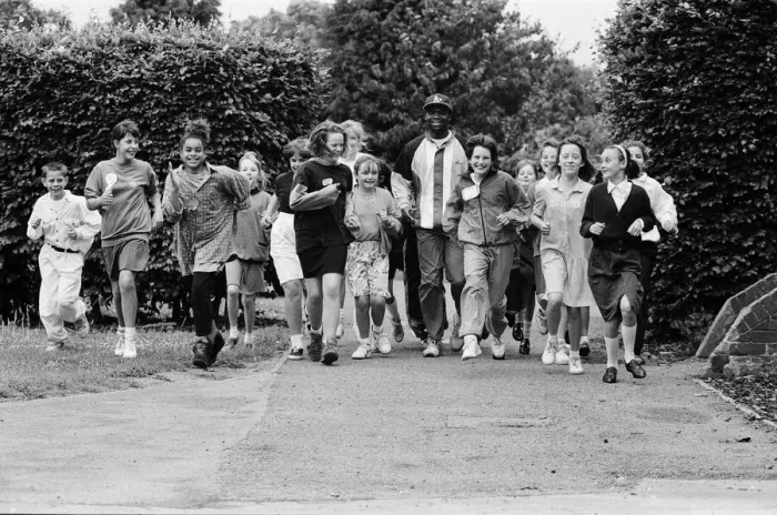 Framed Print : Kriss Akabusi at Geoffrey Field School, Reading. 8th July 1991 Framed Print : Kriss Akabusi at Geoffrey Field School, Reading. 8th July 1991