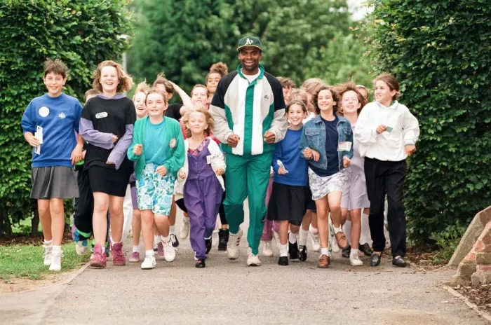 Framed Print : Kriss Akabusi at Geoffrey Field School, Reading. 8th July 1991 Framed Print : Kriss Akabusi at Geoffrey Field School, Reading. 8th July 1991