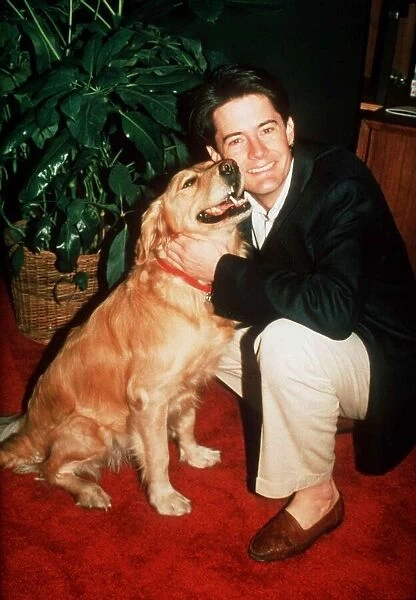 Kyle Maclachlan actor with Golden Retriever dog 1991