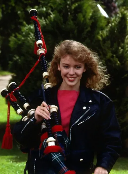 Framed Print : Kylie Minogue holding bagpipes September 1988