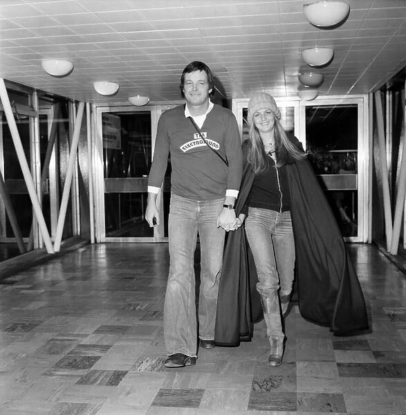 L. A. P. Twiggy. Model and singer Twiggy and boy friend Richard Whitney leaving London
