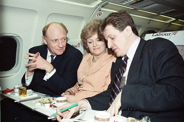 Labour leader Neil Kinnock and his wife Glenys on the campaign plane with Alastair