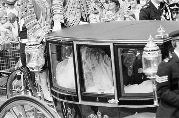 Lady Diana Spencer and her father Earl Spencer in the Royal Carriage that leaves Clarence