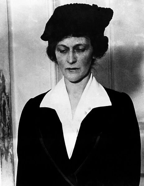 Lady Nancy Astor, with hat she wore on first entering Parliament. December 1919
