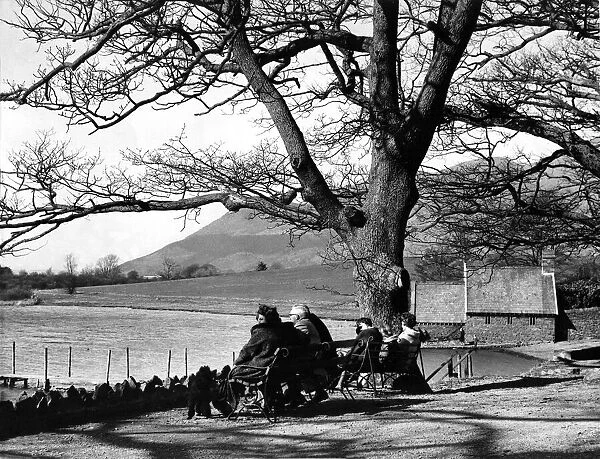 Lake District - Derwentwater - People sit on the benches