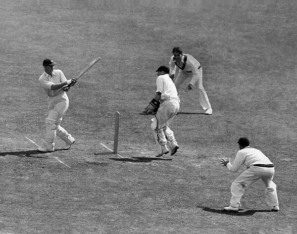 Lancashire v. Yorkshire. N. W. D. Yardley swings round to smite a ball from K