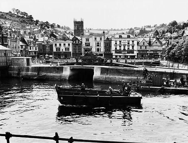 Landing craft and armoured cars seen at Dartmouth during the preparations for Operation