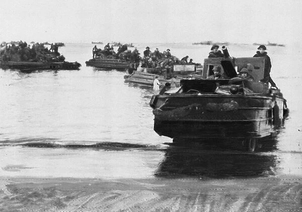 Landing craft carrying British troops near Nettuno. Picture