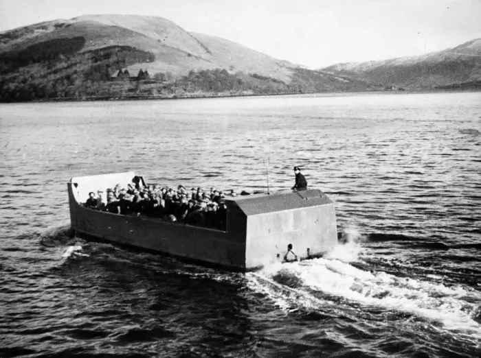 Framed Print : Landing craft laden with troops approaching the Lofoten Islands. March 1941