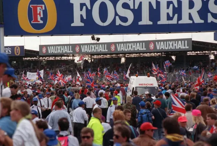 Framed Print : A large crowd celebrating July 1992 after Nigel Mansell had won the British Grand Framed Print : A large crowd celebrating July 1992 after Nigel Mansell had won the British Grand