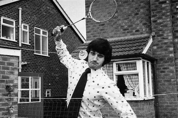 Larry Lloyd Liverpool central defender, pictured playing badminton at his home in Formby