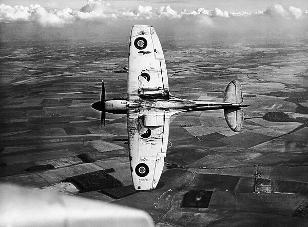 The latest Spitfire fighter plane, the Spitfire Mark XII with Rolls Royce Griffon engine