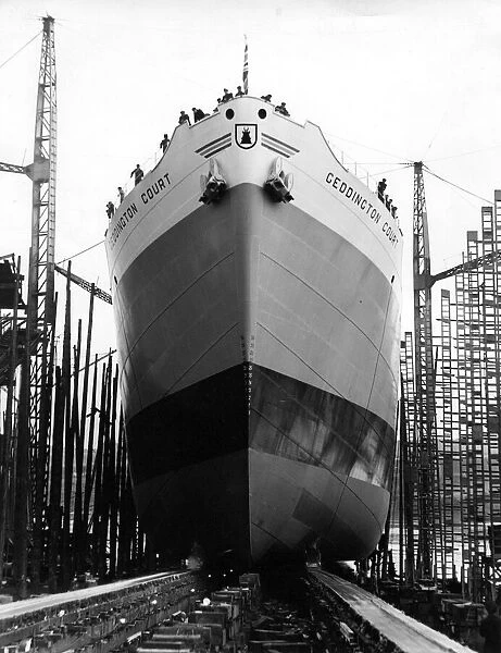 Launch of the 10, 900-ton ship Geddington Court from Short Brothers shipyard on the River
