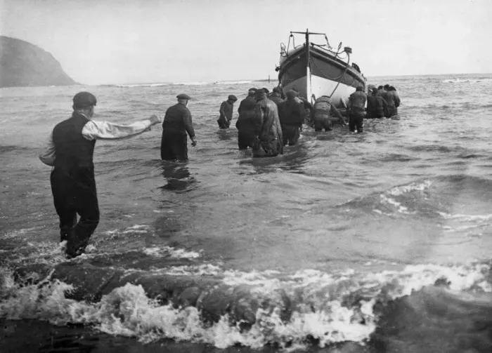 Framed Print : Launching the lifeboat at Robin Hoods Bay near Whitby in North Yorkshire to rescue