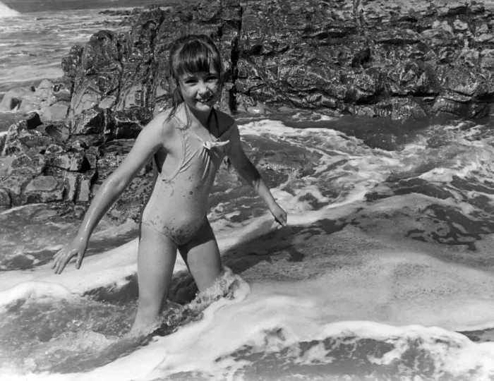 Framed Print : Laura Pearce 8 from Caerphilly, plays in the waves at she enjoys the sun at Ogmore by Sea Framed Print : Laura Pearce 8 from Caerphilly, plays in the waves at she enjoys the sun at Ogmore by Sea
