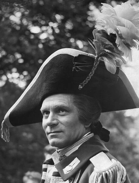 Laurence Olivier in costume on set during filming of The Devils Disciple - July 1958
