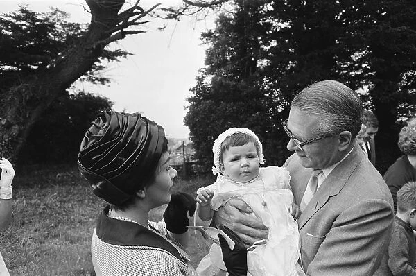 Laurence Olivier and Joan Plowright attend the Christening of their daughter Tamsin