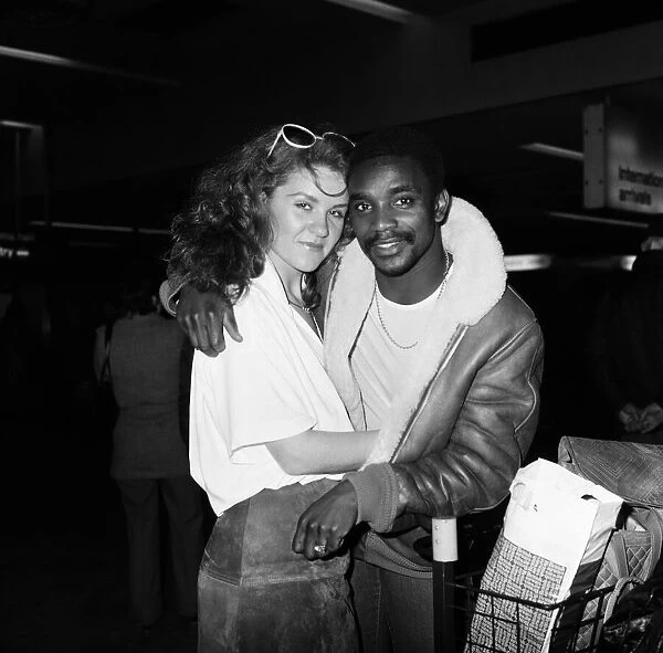 Laurie Cunningham and fiancee Nikki Brown arriving from Madrid. 4th February 1980
