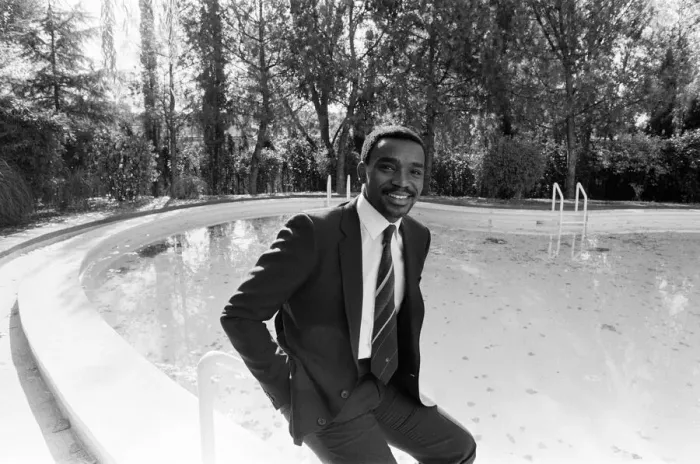 Framed Print : Laurie Cunningham poses for the camera near swimming pool Madrid Spain Framed Print : Laurie Cunningham poses for the camera near swimming pool Madrid Spain