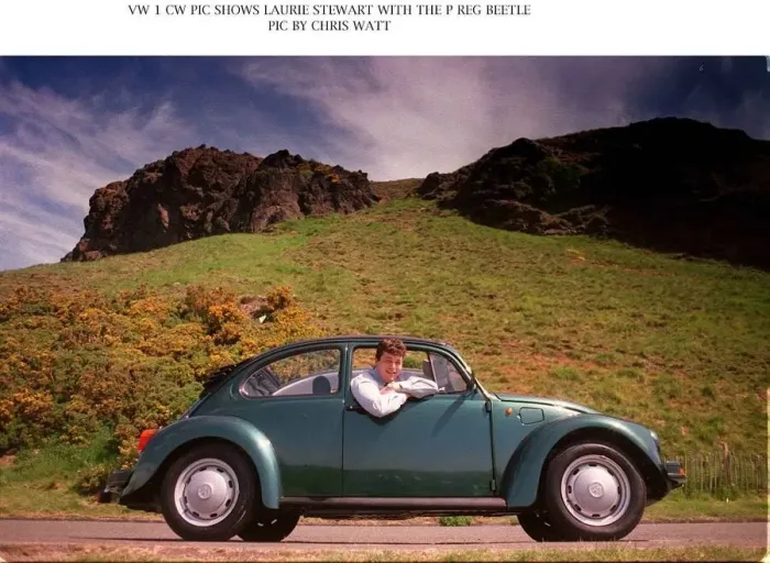 Framed Print : Laurie Stewart with P registration Volkswagen Beetle leaning out of car Framed Print : Laurie Stewart with P registration Volkswagen Beetle leaning out of car