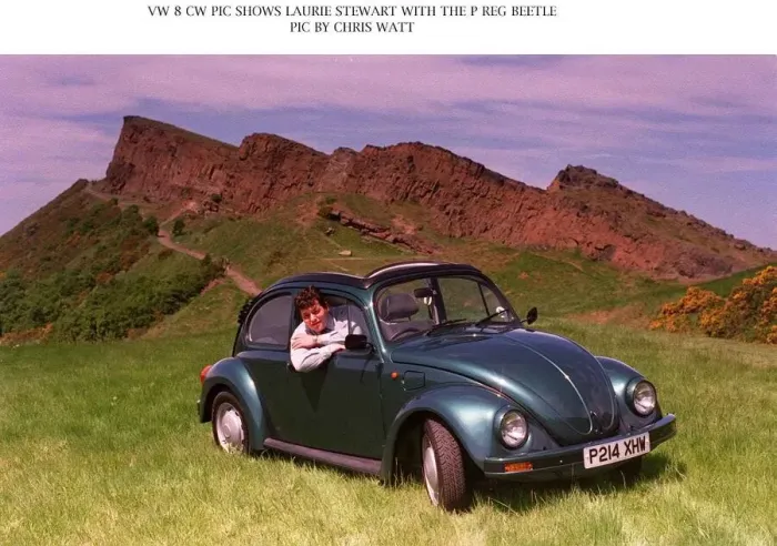 Framed Print : Laurie Stewart sitting in P registration Volkswagen Beetle car Framed Print : Laurie Stewart sitting in P registration Volkswagen Beetle car