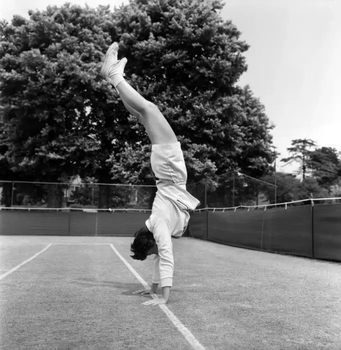 Framed Print : Lawn Tennis at Beckenham. Woman training before a match at the club June Framed Print : Lawn Tennis at Beckenham. Woman training before a match at the club June
