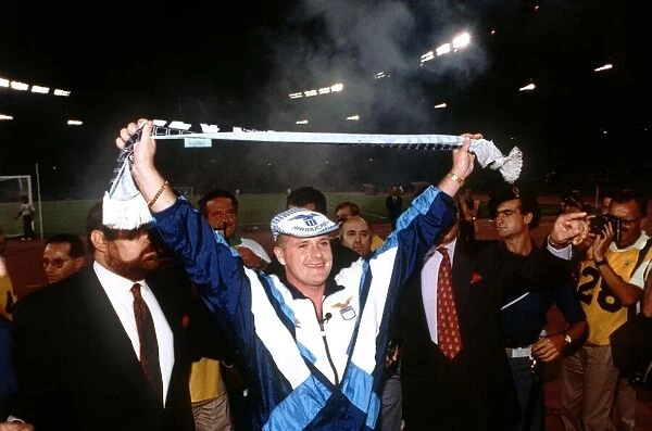 Lazio footballer Paul Gascoigne greets supporters at the Stadio Olimpico in Rome as he