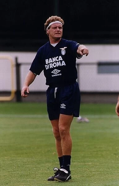 Lazio footballer Paul Gascoigne passing the ball during a training session in Italy