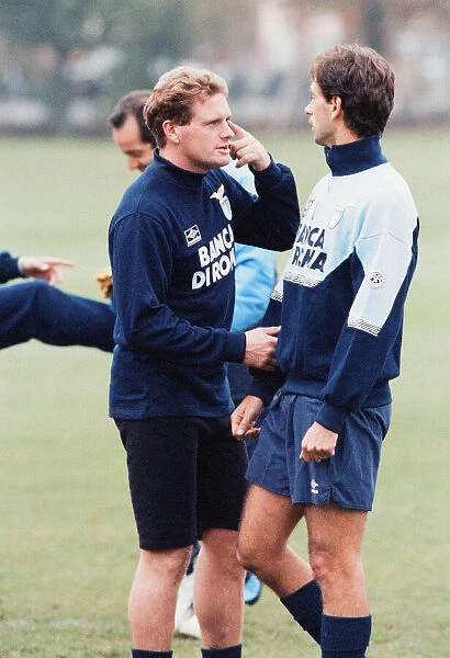 Lazio footballer Paul Gascoigne talking with teammates during a team training session