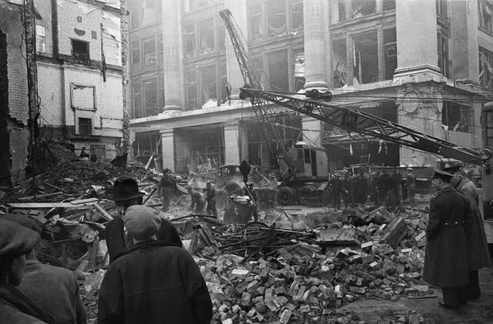 Framed Print : LCC and Civil Defence workers seen here clearing up following a V2 explosion at the Red