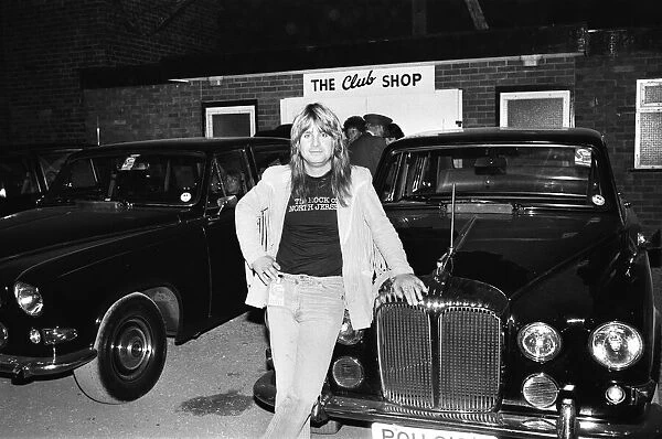 Lead singer Ozzy Osbourne of Black Sabbath pictured with Rolls Royce