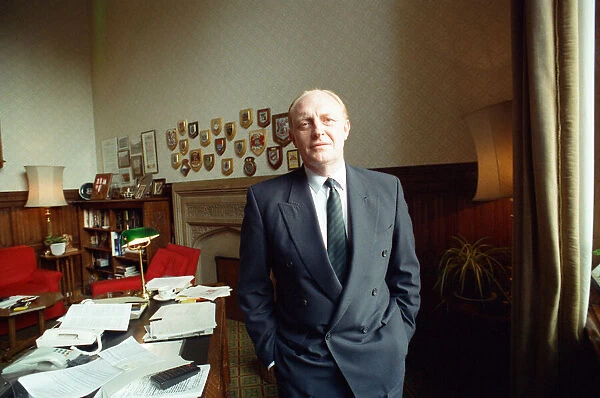Leader of the Labour party Neil Kinnock in his office. 11th July 1990