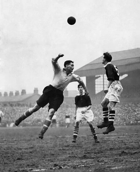 Leading lights at Turf Moor-Liddell of Liverpool who had moved into the centre forward
