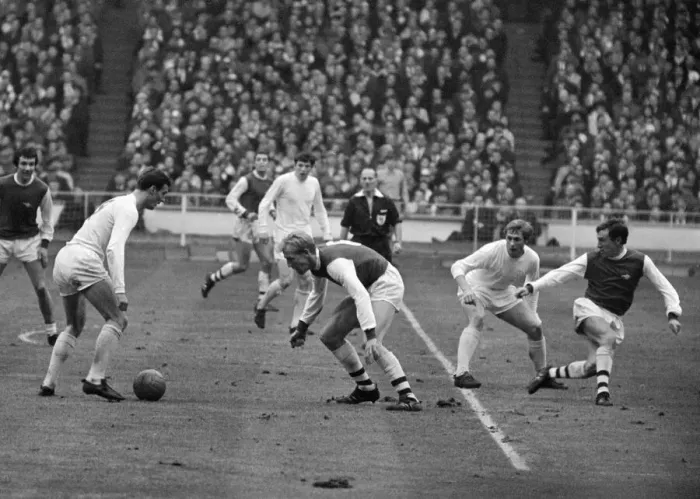 Framed Print : League Cup Final 1968. Arsenal v. Leeds. Paul Madeley with ball at hi feet about to Framed Print : League Cup Final 1968. Arsenal v. Leeds. Paul Madeley with ball at hi feet about to