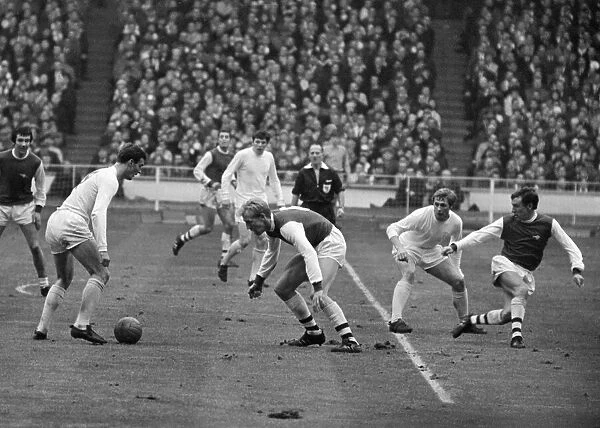 League Cup Final 1968. Arsenal v. Leeds. Paul Madeley with ball at hi feet about to