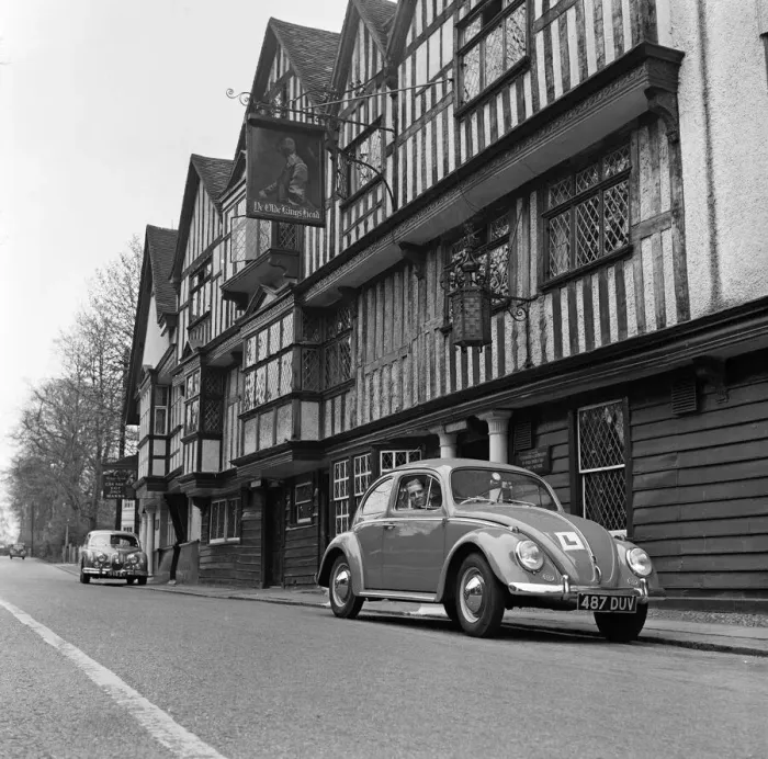 Framed Print : Learner driver in a Volkswagen Beetle. May 1962