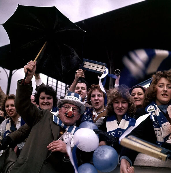 Leciester City fans seen here on F. A. Cup final day before the start of the match against