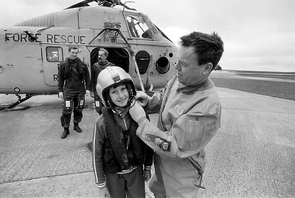 Lee Goodey seen here taking a flight with the crew of a RAF Westland Wessex Search