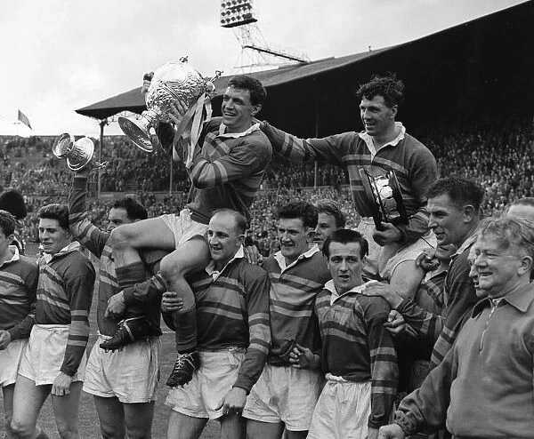 Leeds celebrate their 9 - 7 victory over Barrow in the Rugby League Cup Final at Wembley