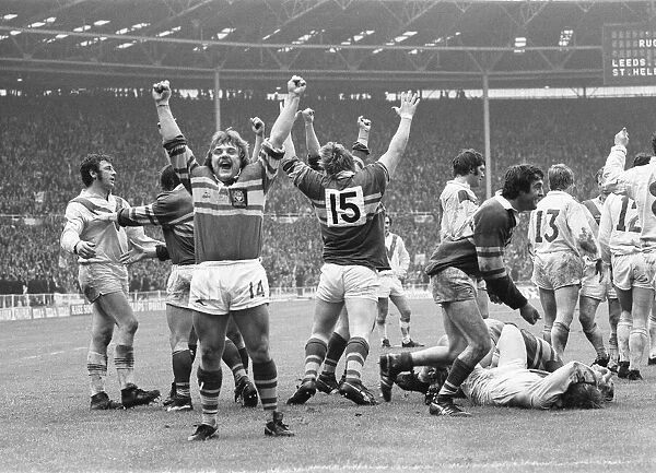 Leeds player celebrate their victory over St Helens in the Rugby League Cup at Wembley as
