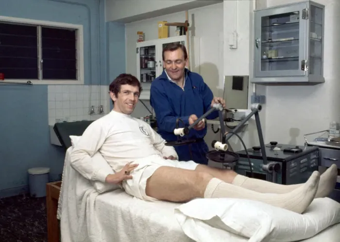 Framed Print : Leeds United footballer Johnny Giles receives tretment on an injury in the physio room
