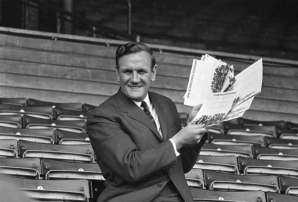 Leeds United manager Don Revie at Elland Road with telegrams congratulating him